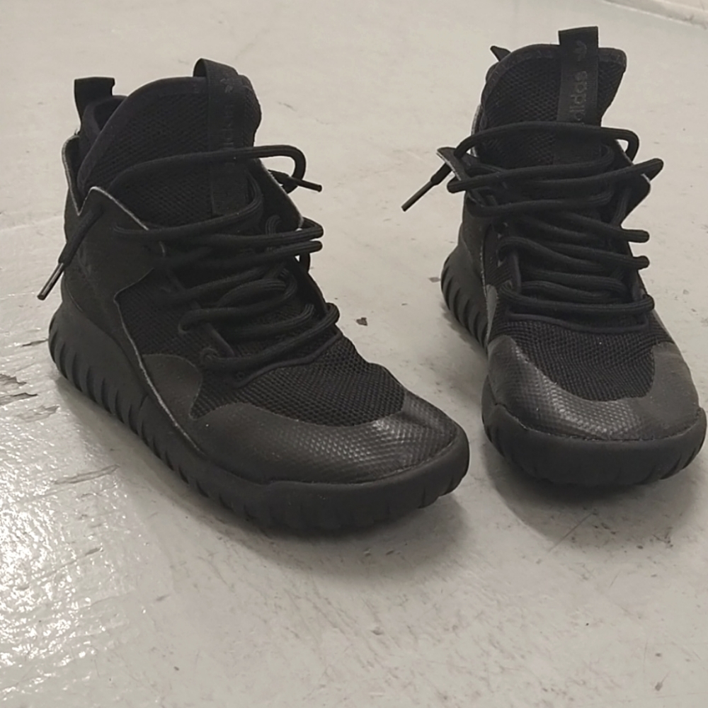 Black slip-on sneakers